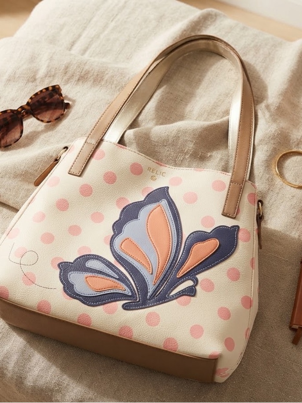 Relic Cream Shoulder Bag with Pink Polka Dots and Blue-Peach Butterfly Applique
